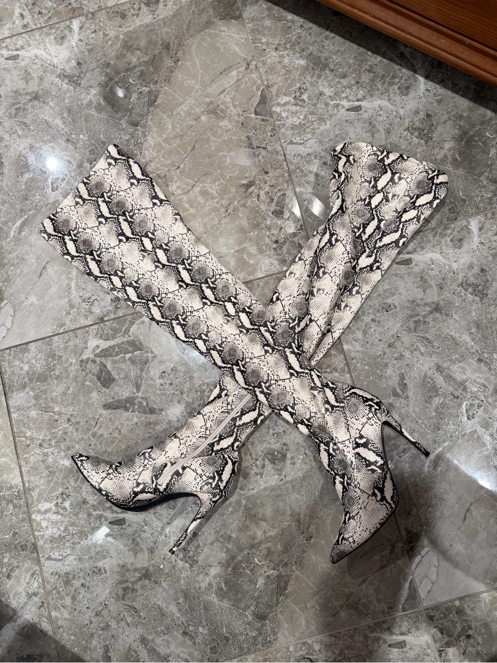 Steven Madden knee high snake boots